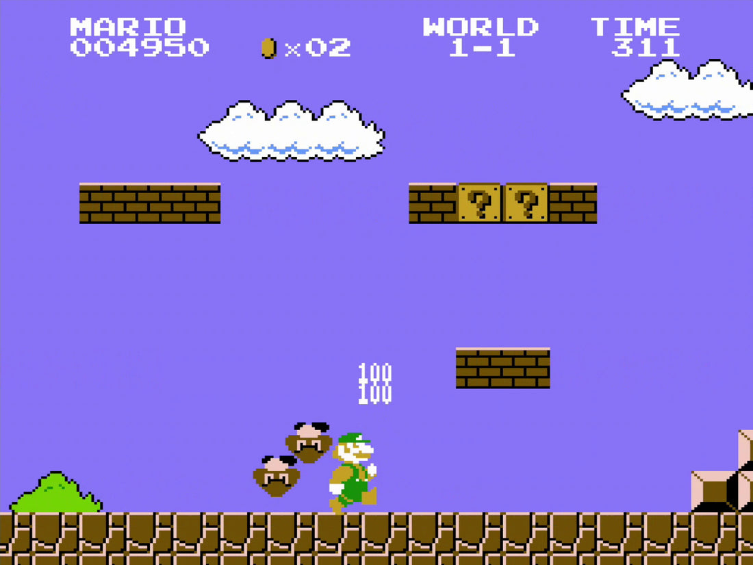Écran du Monde 1-1 de Super Mario Bros. sur NES, Mario face à un Goomba au-dessus des briques